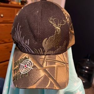 Camo hat with a deer on it
